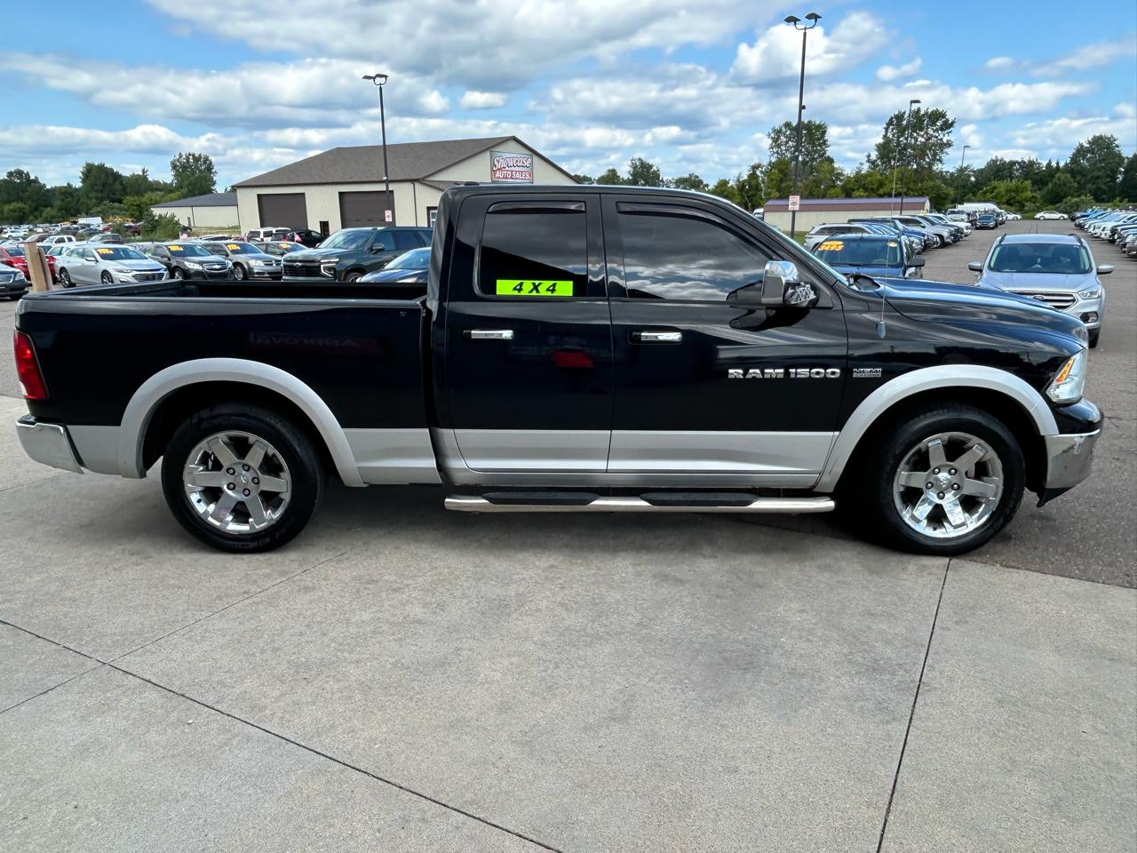 RAM 1500 4WD Quad Cab 140.5" Laramie 2012