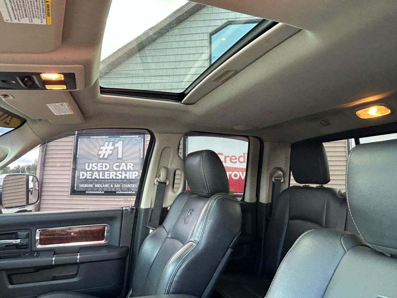 RAM 1500 4WD Quad Cab 140.5" Laramie 2012