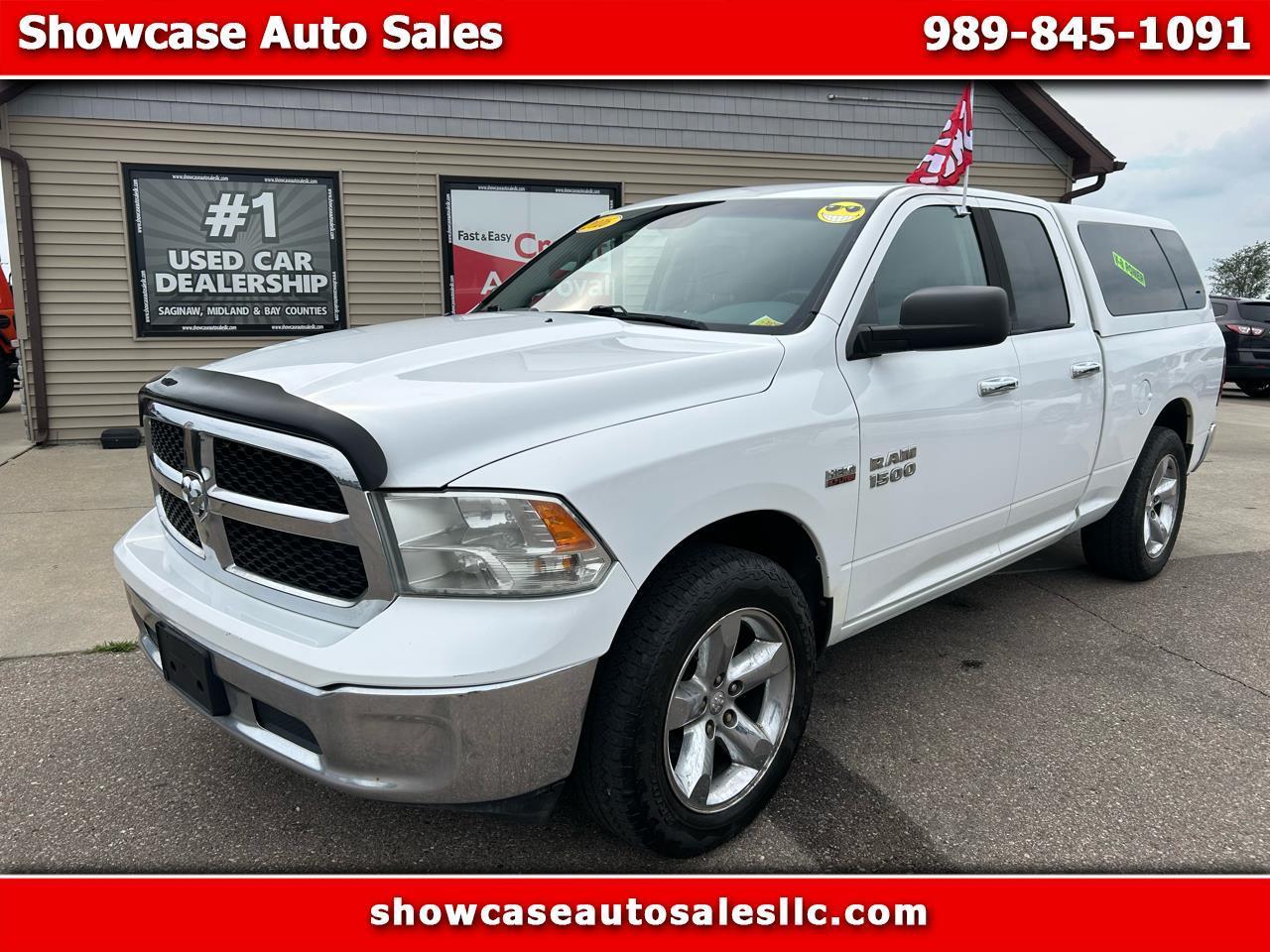 RAM 1500 4WD Quad Cab 140.5" SLT 2016
