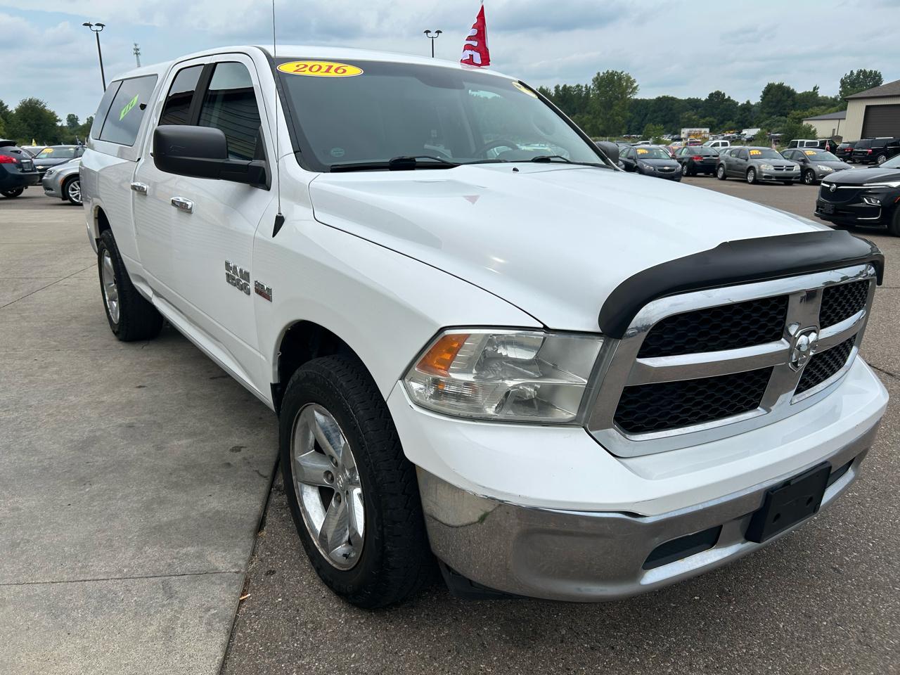 RAM 1500 4WD Quad Cab 140.5" SLT 2016