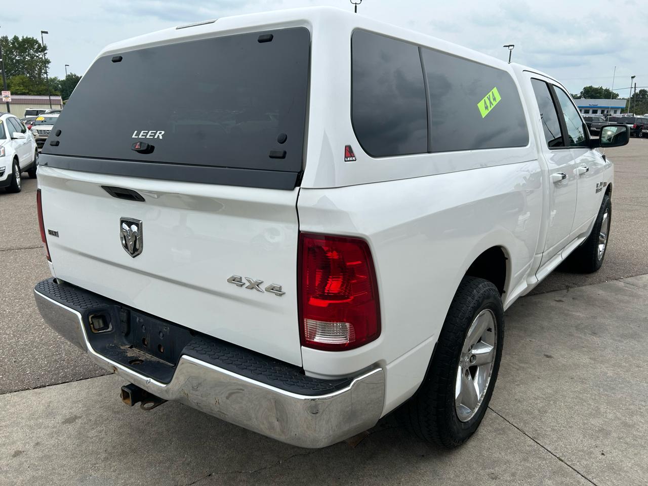 RAM 1500 4WD Quad Cab 140.5" SLT 2016