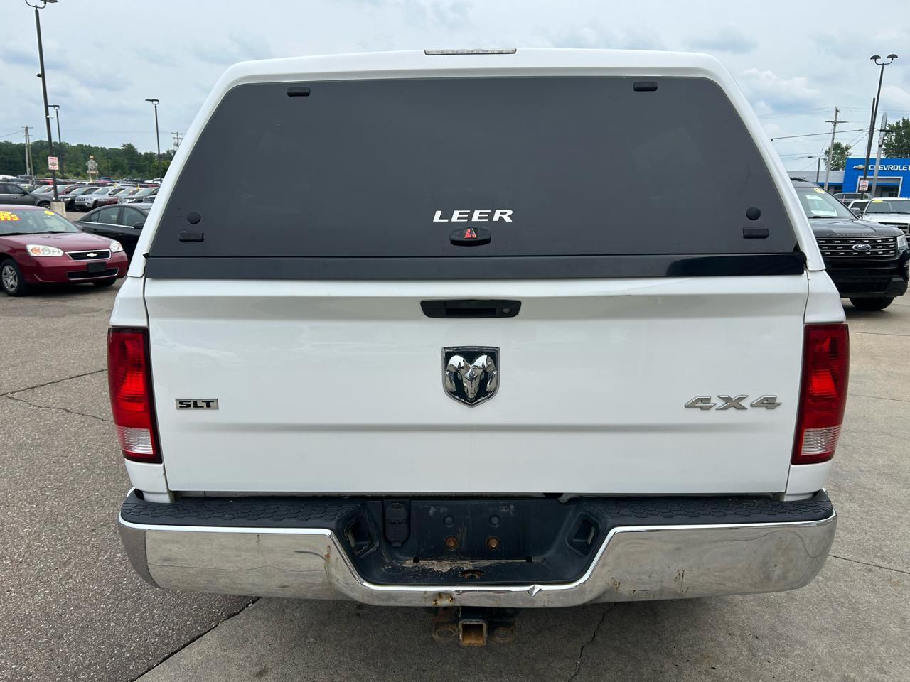 RAM 1500 4WD Quad Cab 140.5" SLT 2016