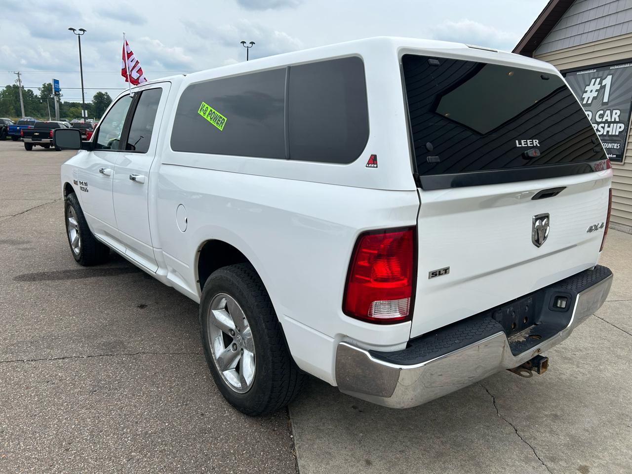 RAM 1500 4WD Quad Cab 140.5" SLT 2016