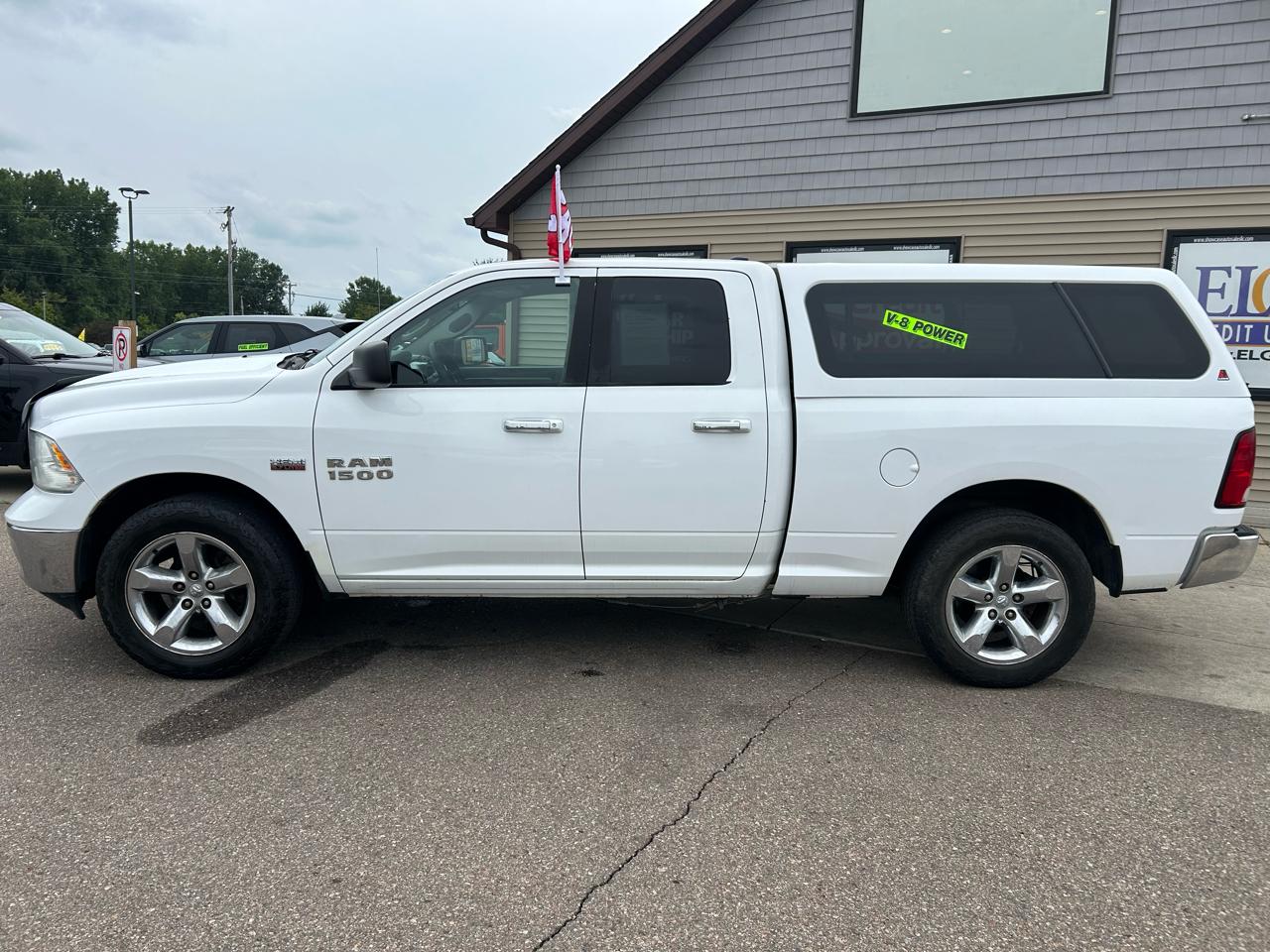 RAM 1500 4WD Quad Cab 140.5" SLT 2016