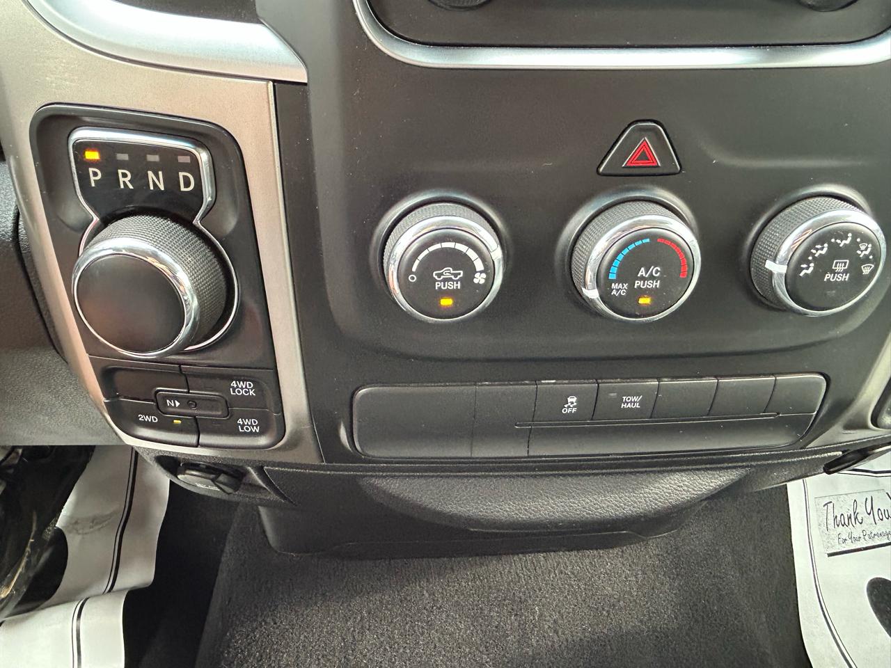 RAM 1500 4WD Quad Cab 140.5" SLT 2016