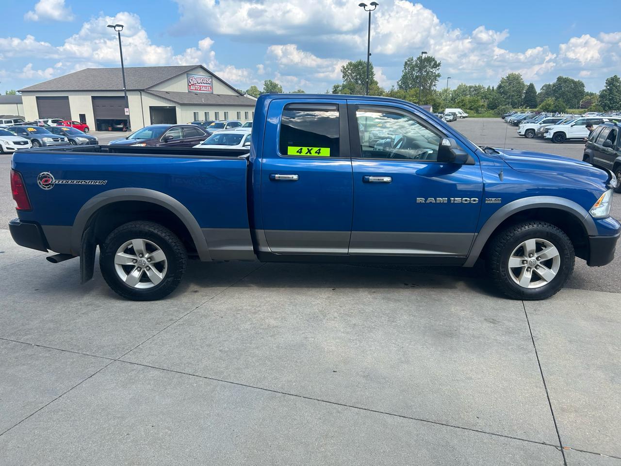 RAM 1500 4WD Quad Cab 140.5" Outdoorsman 2011