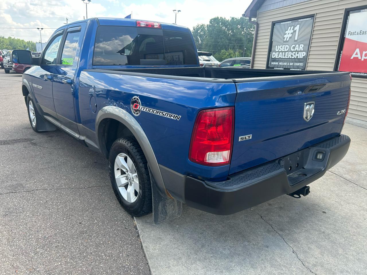 RAM 1500 4WD Quad Cab 140.5" Outdoorsman 2011