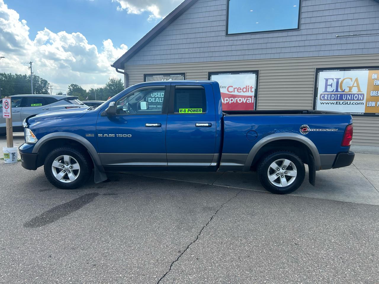 RAM 1500 4WD Quad Cab 140.5" Outdoorsman 2011