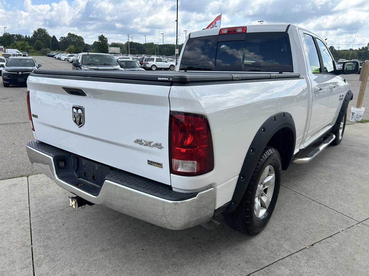 RAM 1500 4WD Quad Cab 140.5" SLT 2015