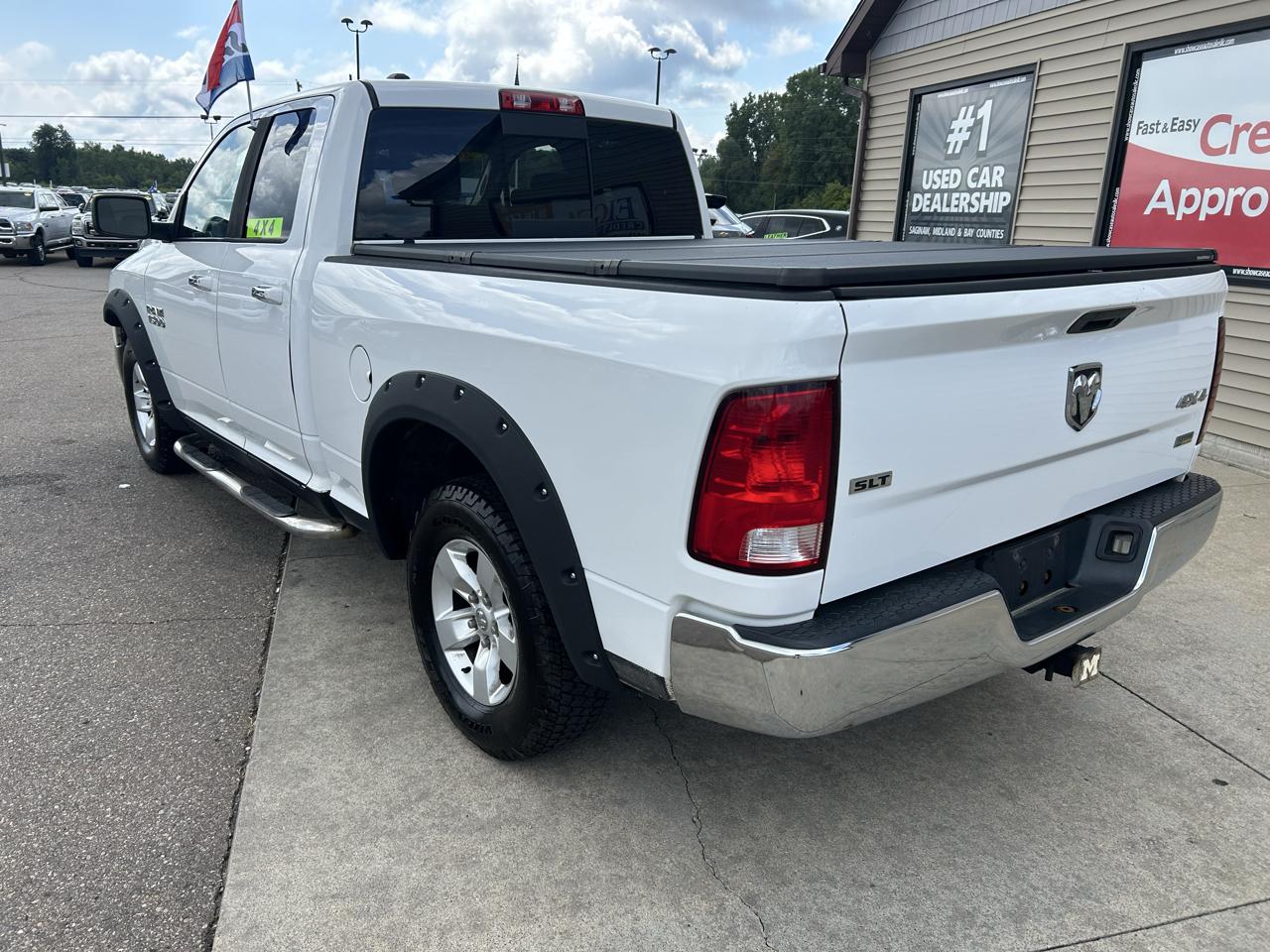 RAM 1500 4WD Quad Cab 140.5" SLT 2015