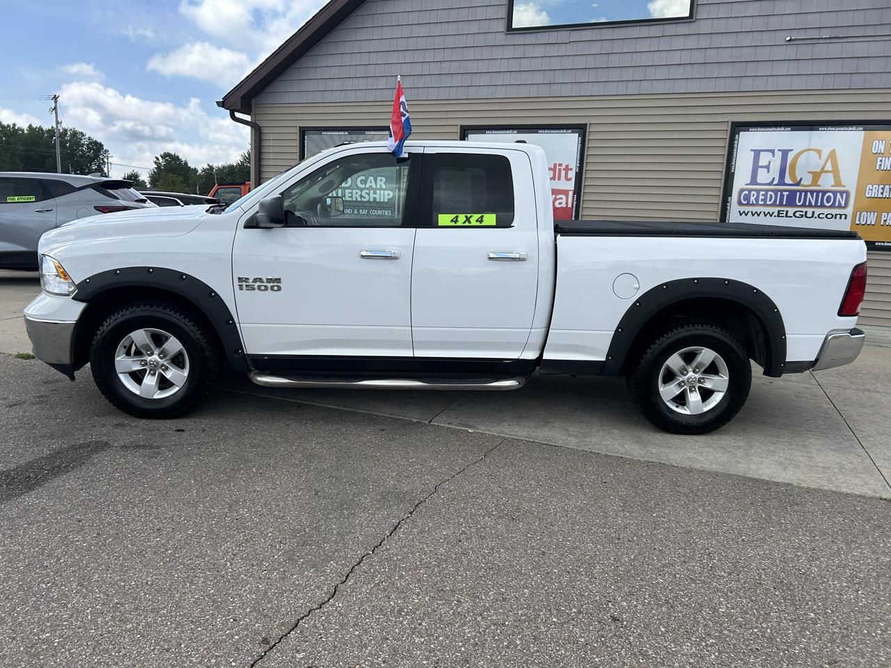 RAM 1500 4WD Quad Cab 140.5" SLT 2015