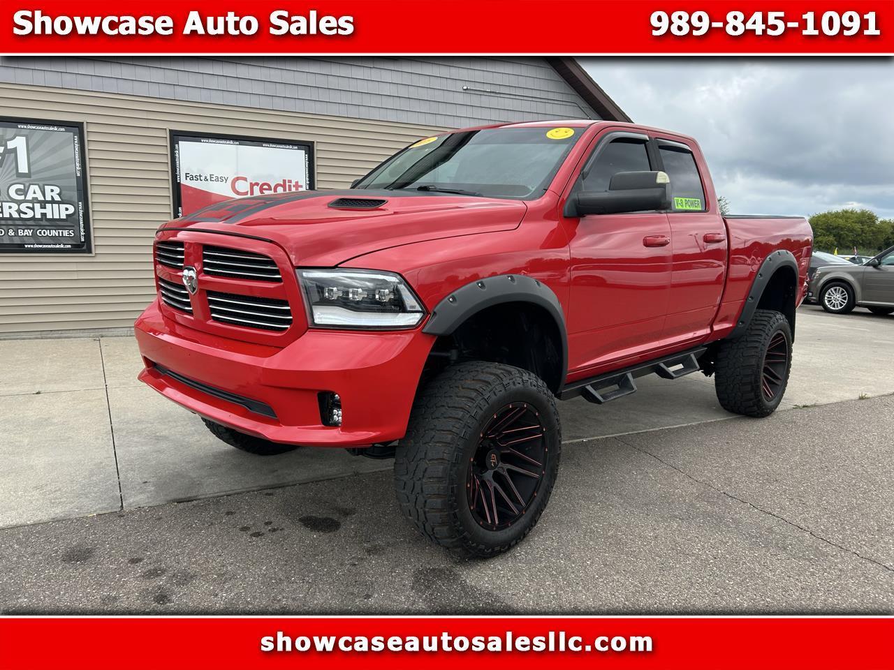 RAM 1500 4WD Quad Cab 140.5" Sport 2016