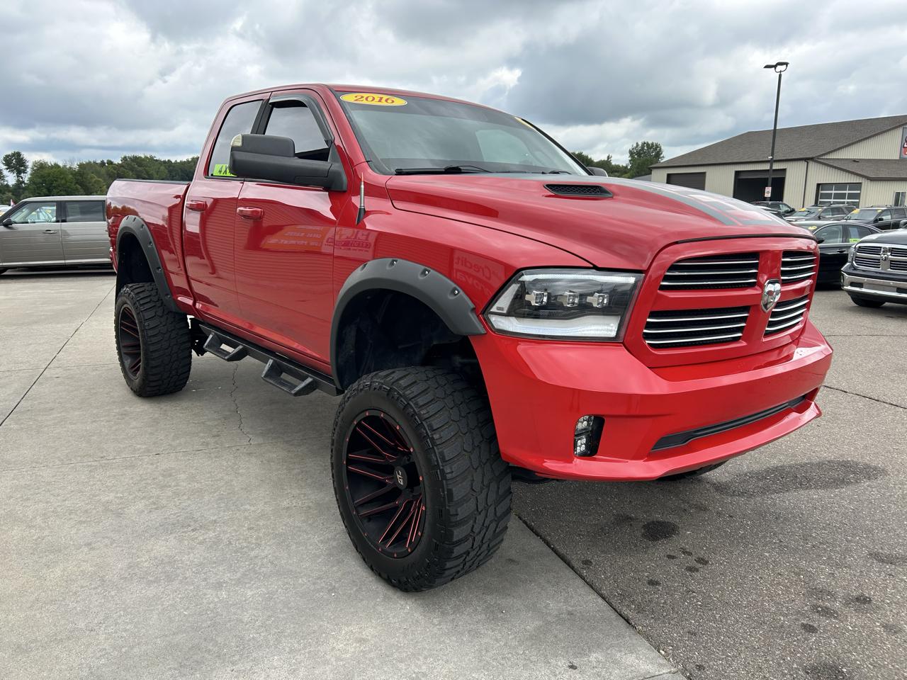 RAM 1500 4WD Quad Cab 140.5" Sport 2016