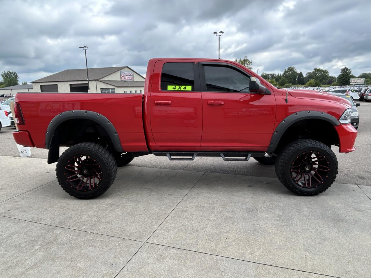RAM 1500 4WD Quad Cab 140.5" Sport 2016