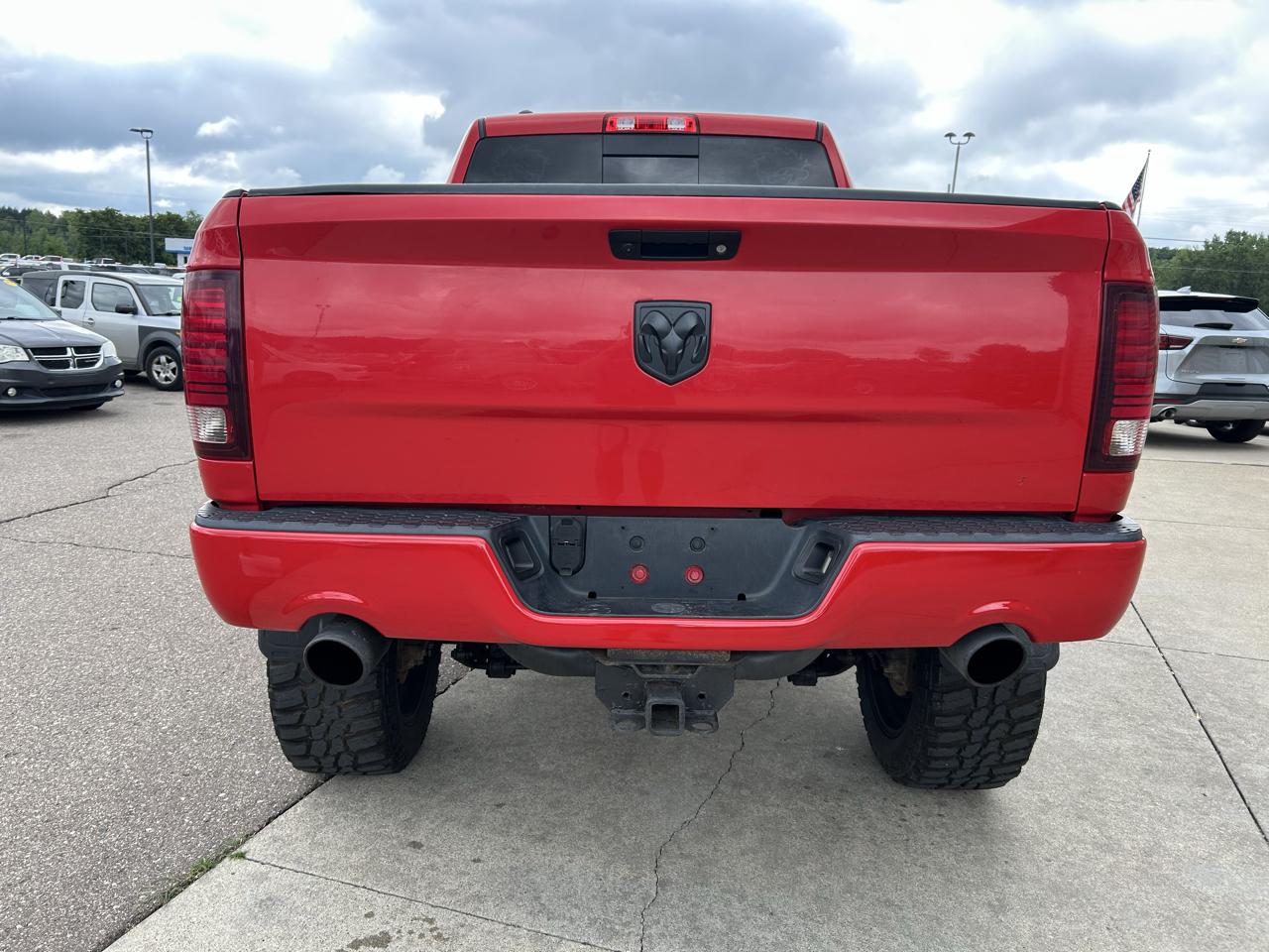 RAM 1500 4WD Quad Cab 140.5" Sport 2016