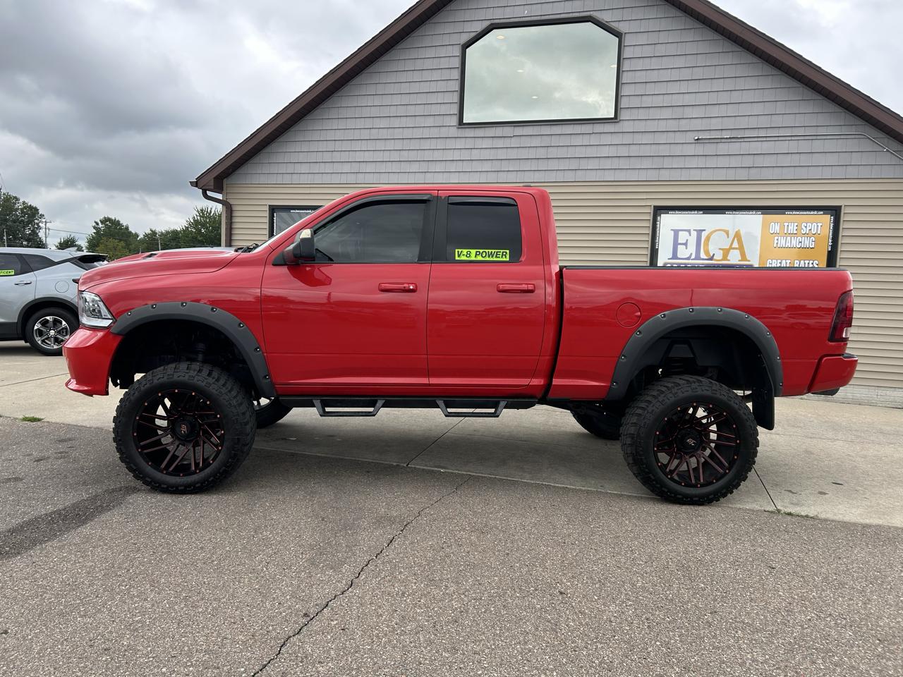 RAM 1500 4WD Quad Cab 140.5" Sport 2016