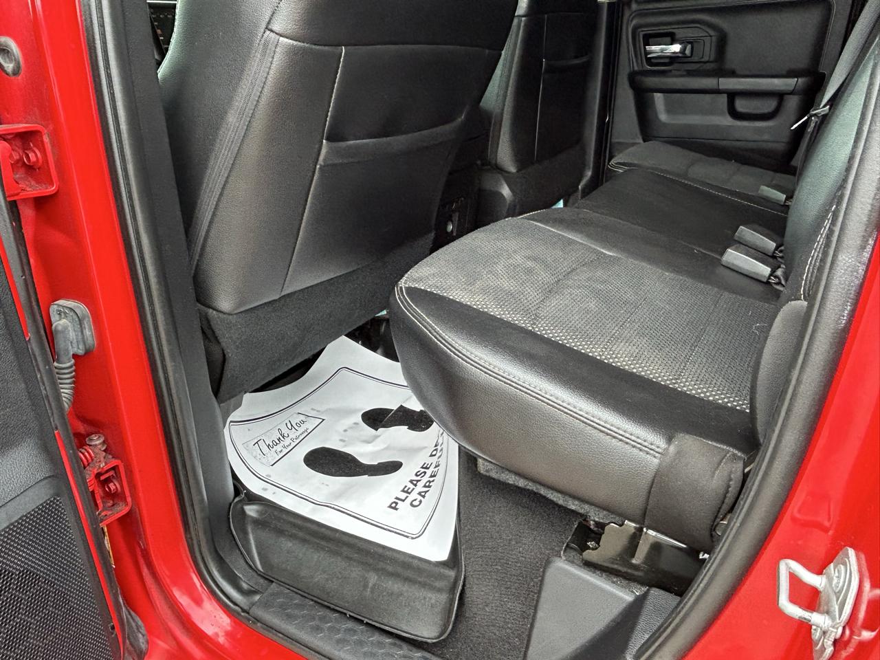 RAM 1500 4WD Quad Cab 140.5" Sport 2016