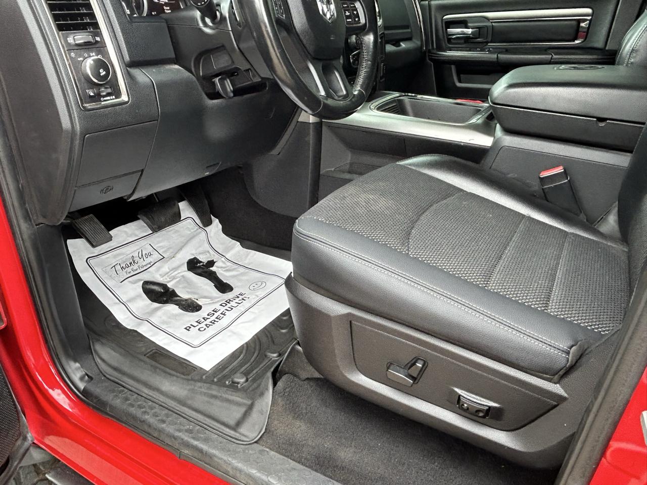 RAM 1500 4WD Quad Cab 140.5" Sport 2016
