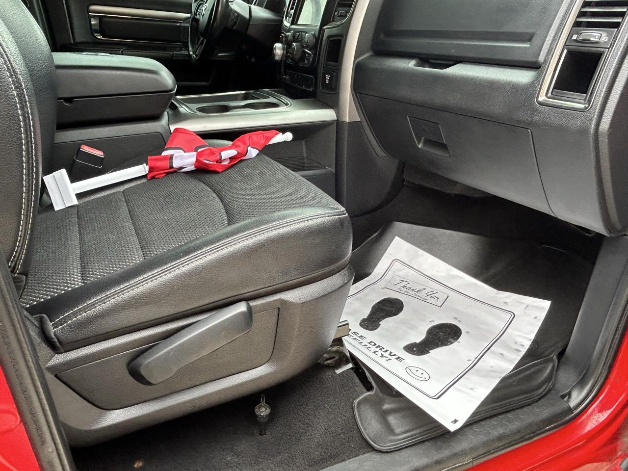 RAM 1500 4WD Quad Cab 140.5" Sport 2016