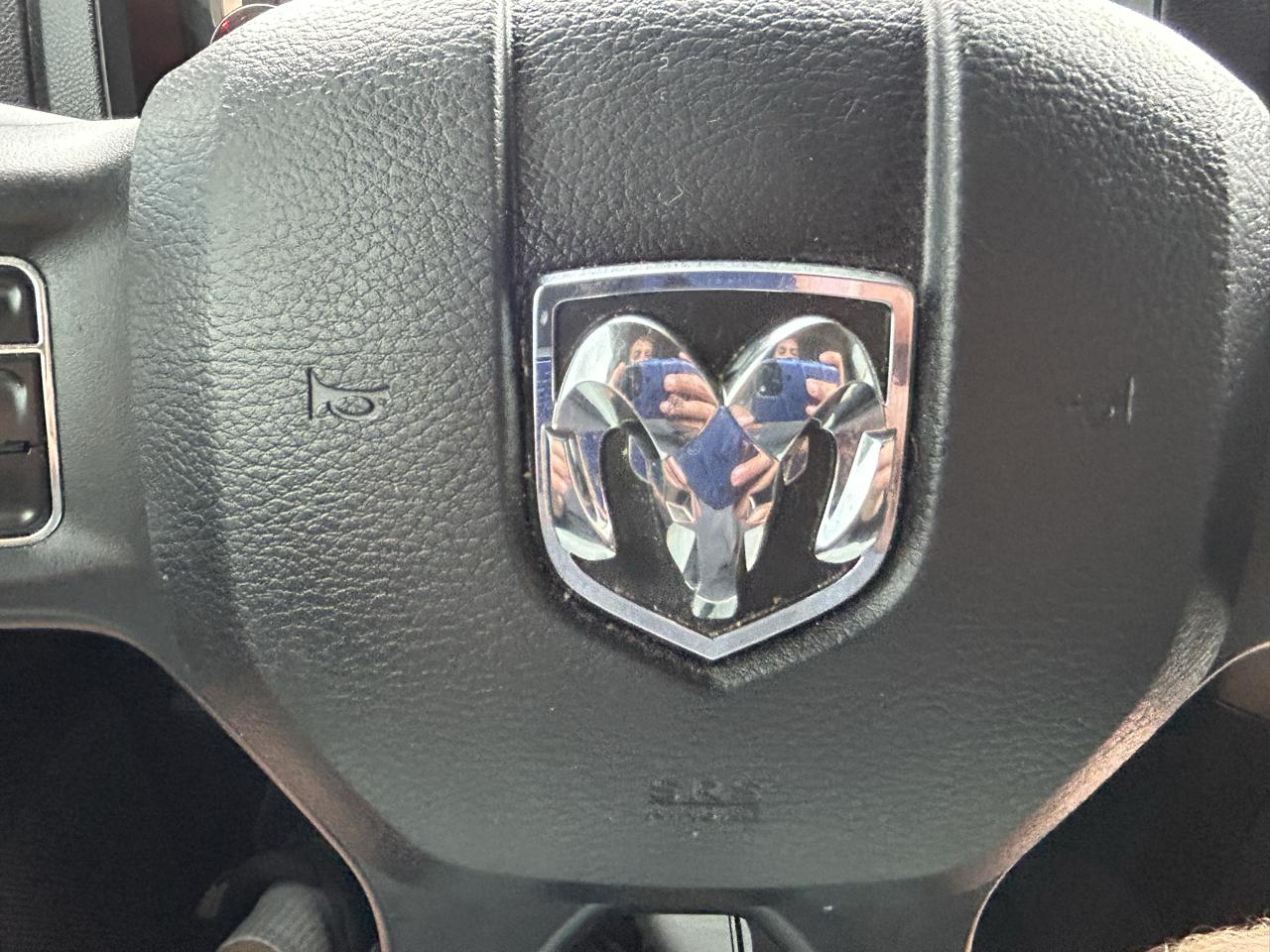 RAM 1500 4WD Quad Cab 140.5" Sport 2016