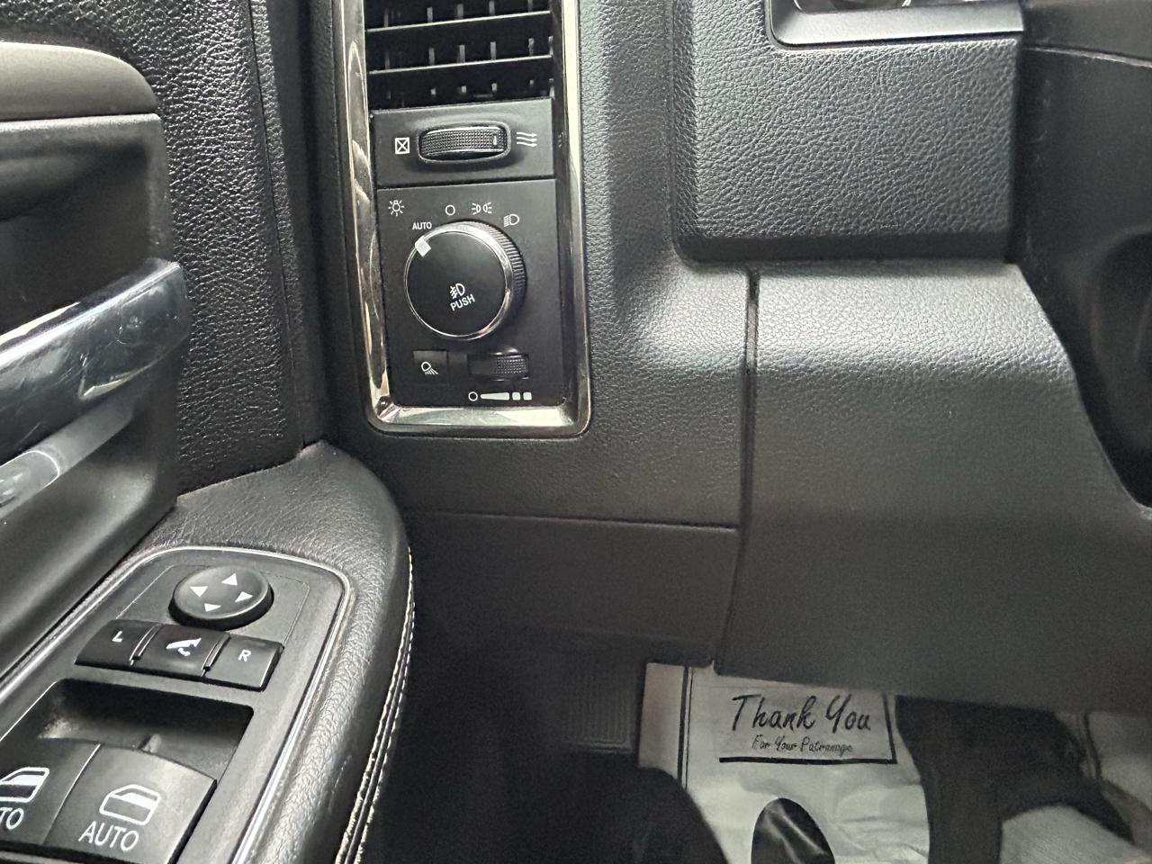 RAM 1500 4WD Quad Cab 140.5" Sport 2016