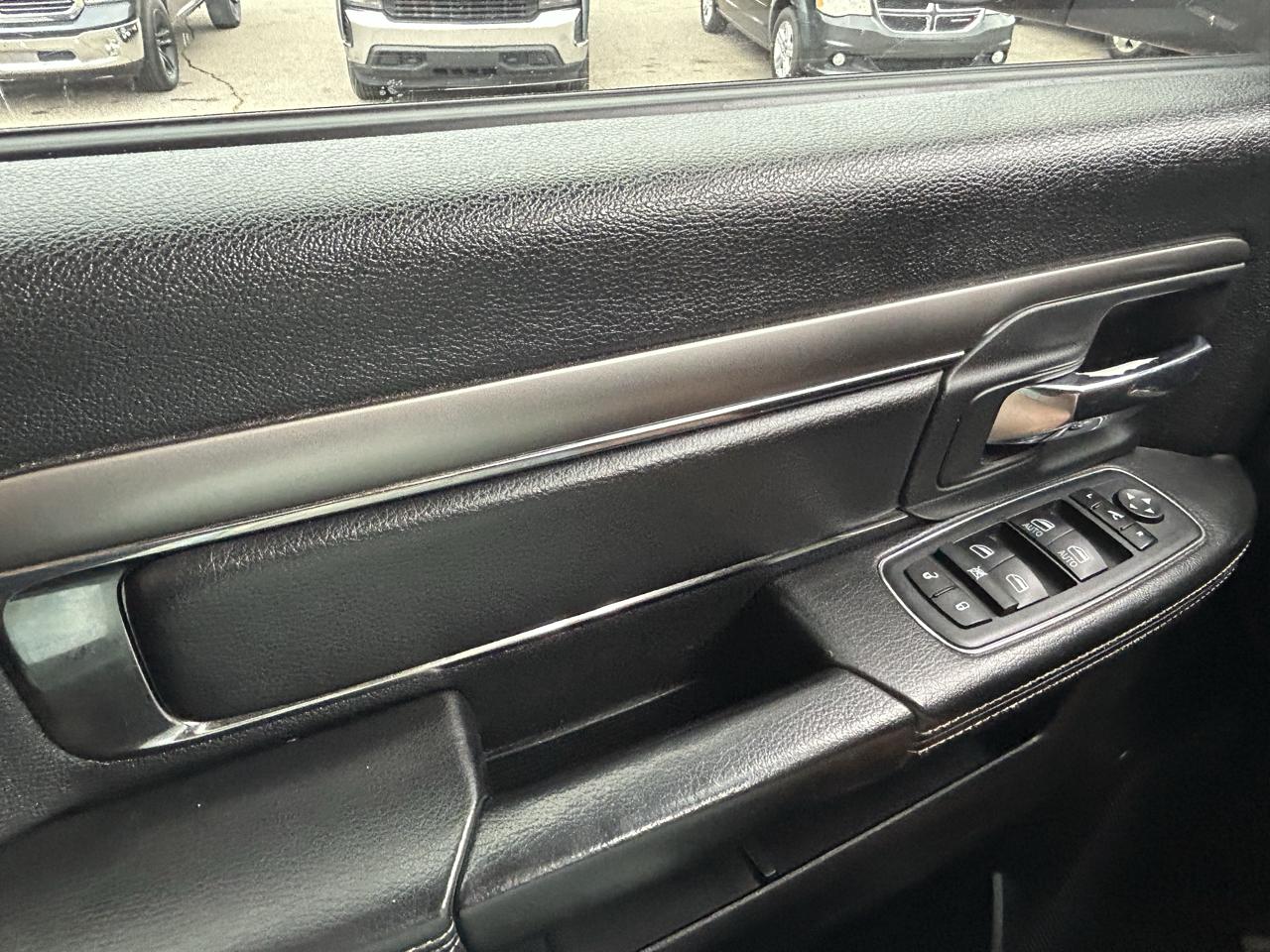 RAM 1500 4WD Quad Cab 140.5" Sport 2016