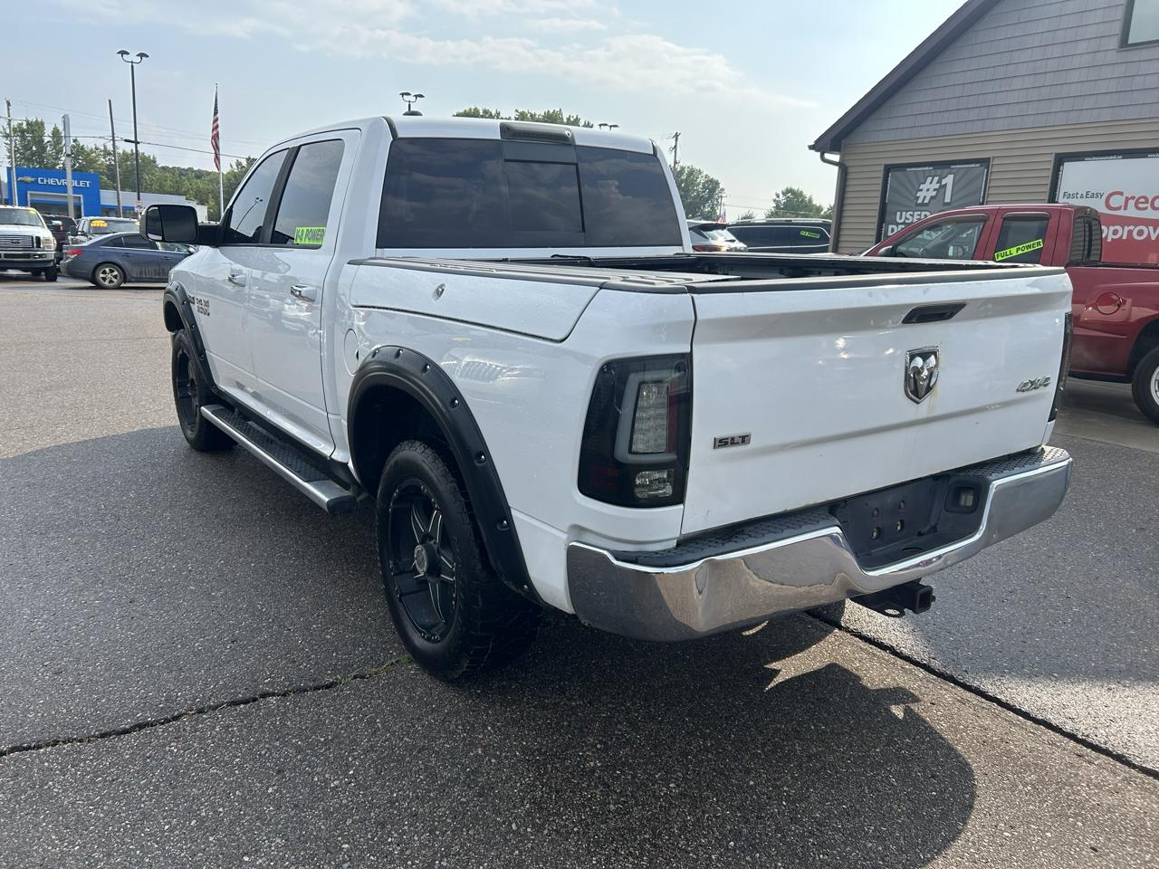 RAM 1500 4WD Crew Cab 140.5" SLT 2013