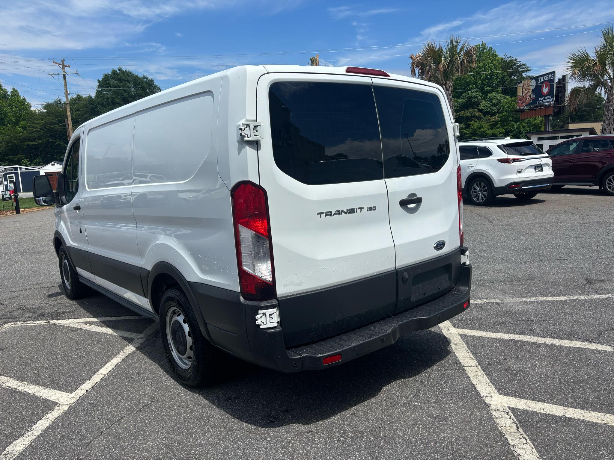 Ford Transit Cargo Van T-150 130" Low Rf 8600 GVWR Swing-Out RH Dr 2016
