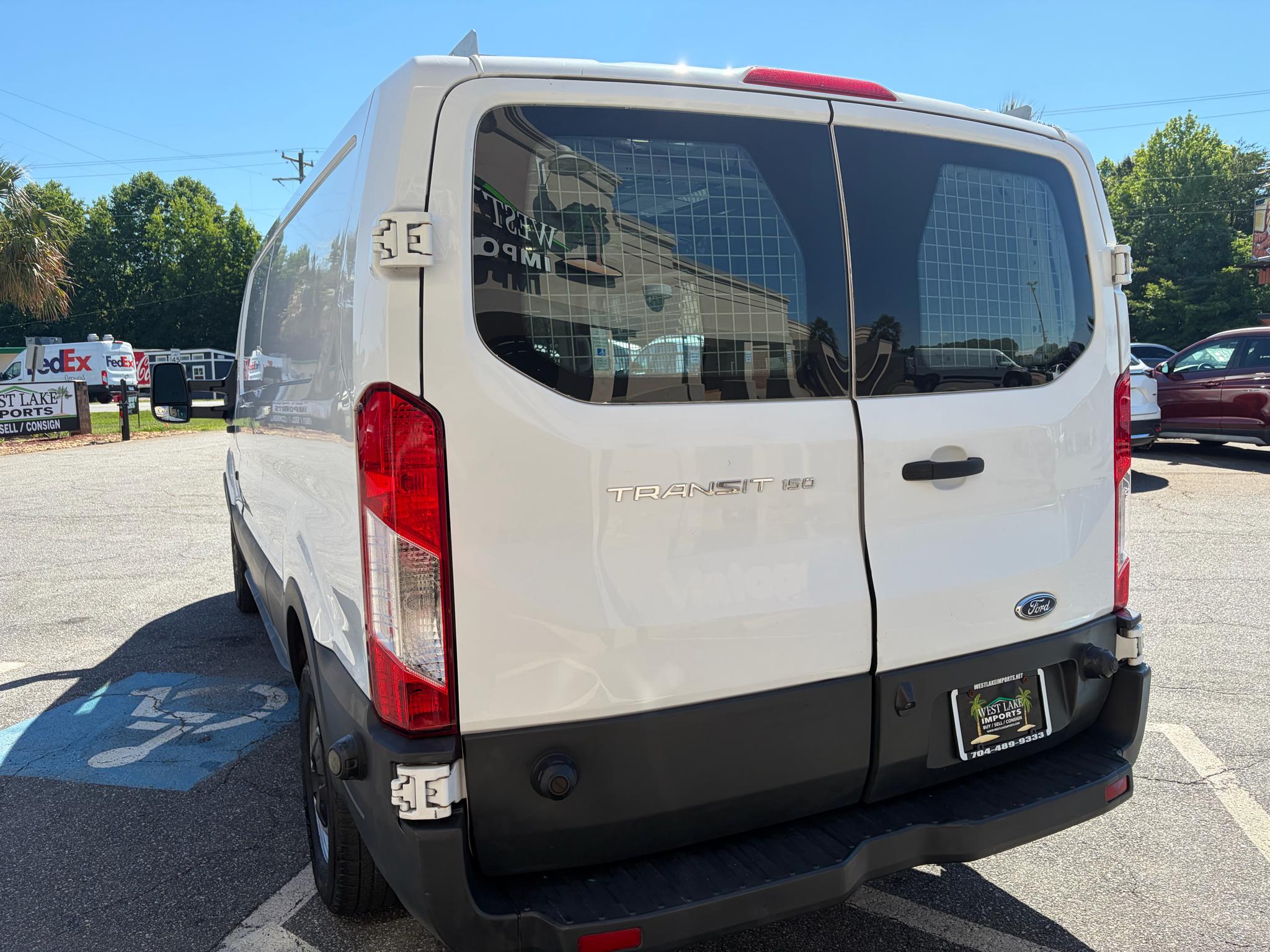 Ford Transit Cargo Van T-150 148" Low Rf 8600 GVWR Sliding RH Dr 2016