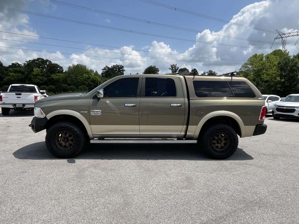 RAM 1500 4WD Crew Cab 140.5" Laramie Longhorn Edition 2013