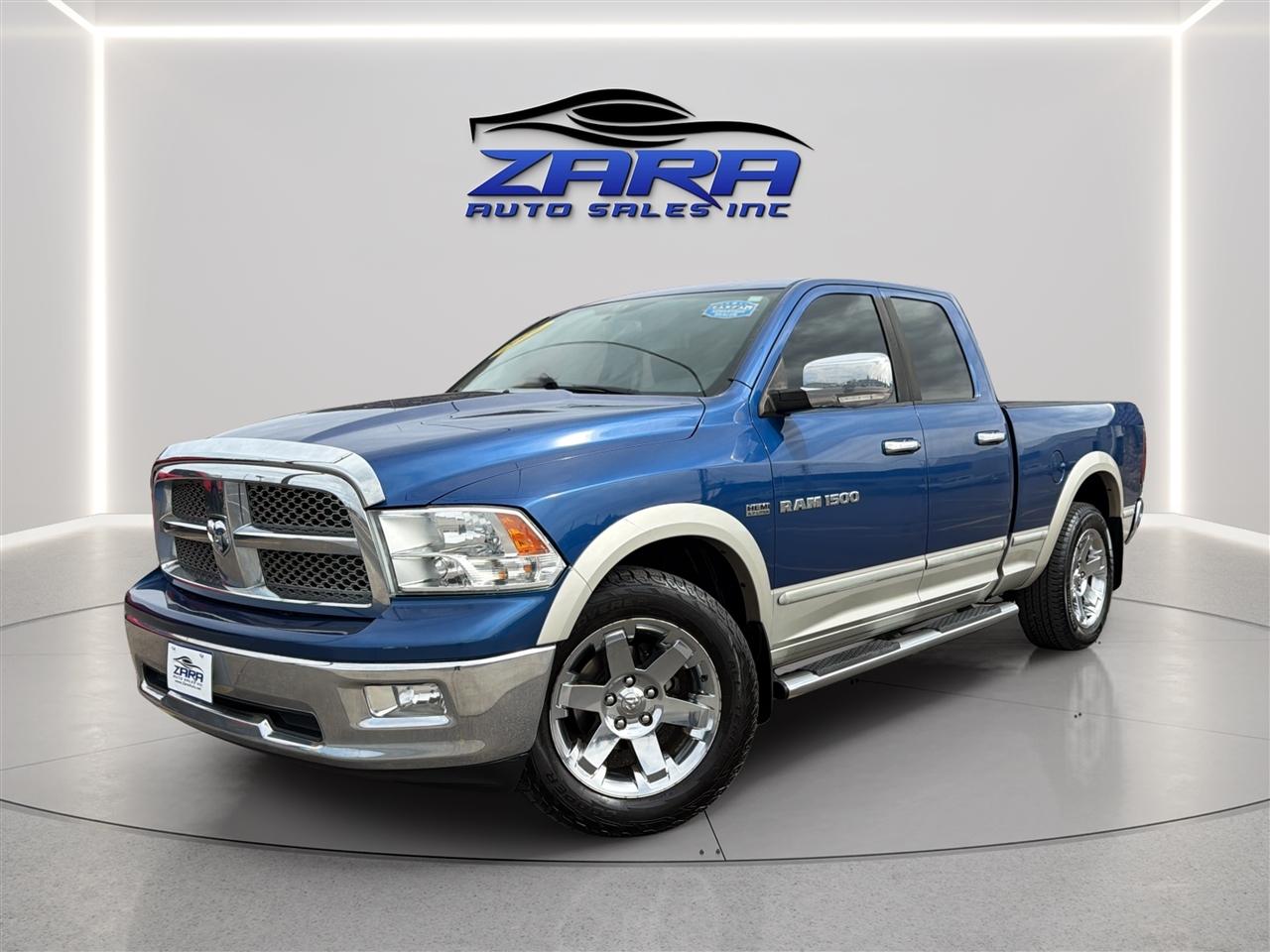 2011 RAM 1500 4WD Quad Cab 140.5" Laramie