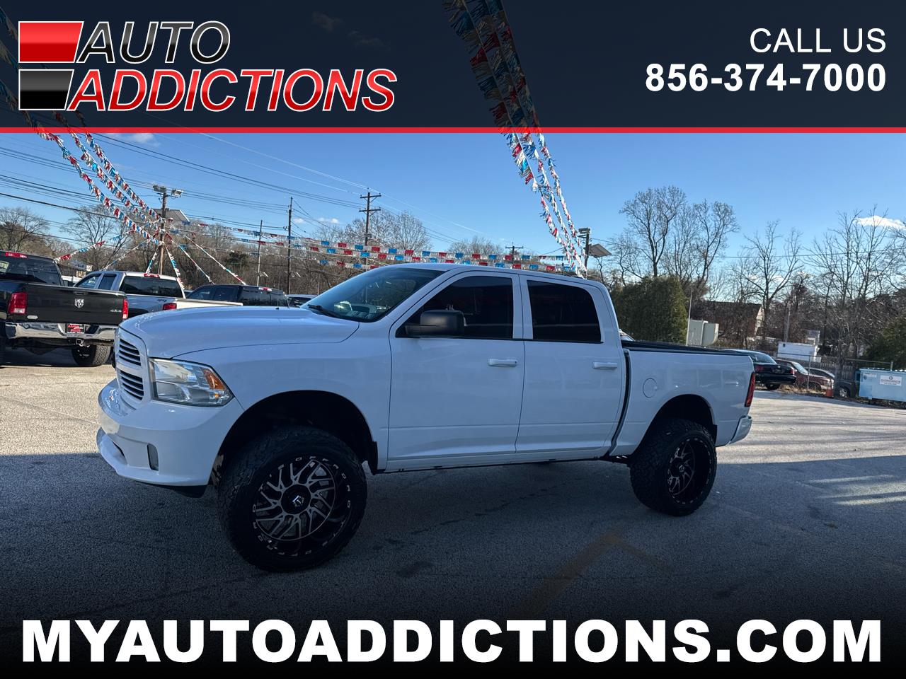 2014 RAM 1500 4WD Crew Cab 140.5" Sport