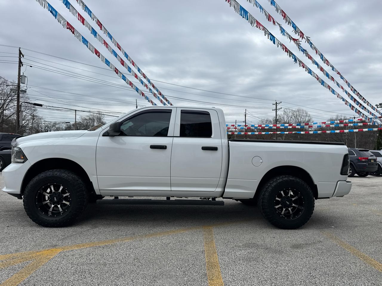 RAM 1500 4WD Quad Cab 140.5" Big Horn 2016