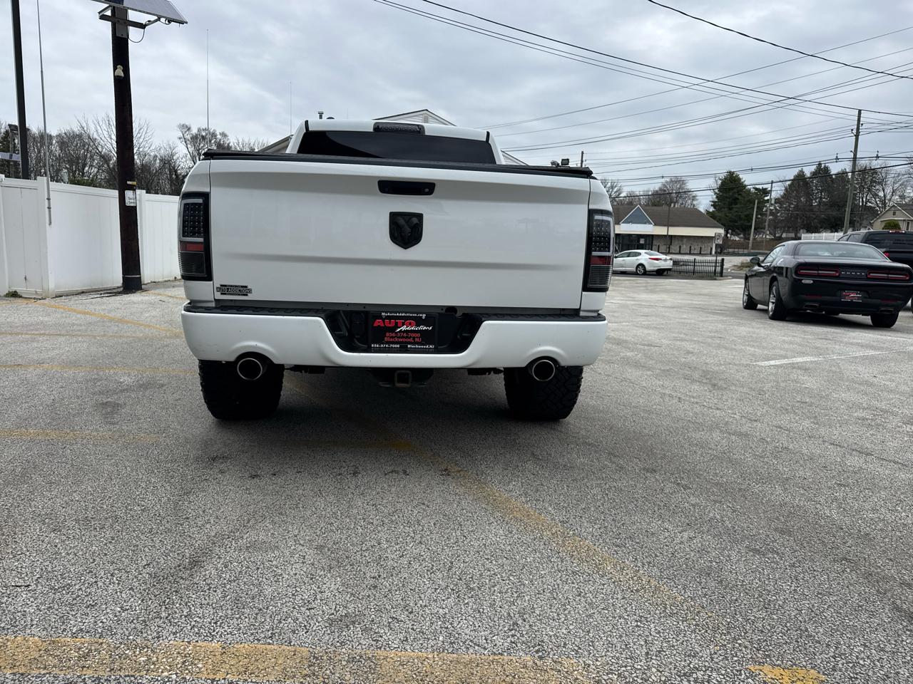 RAM 1500 4WD Quad Cab 140.5" Big Horn 2016