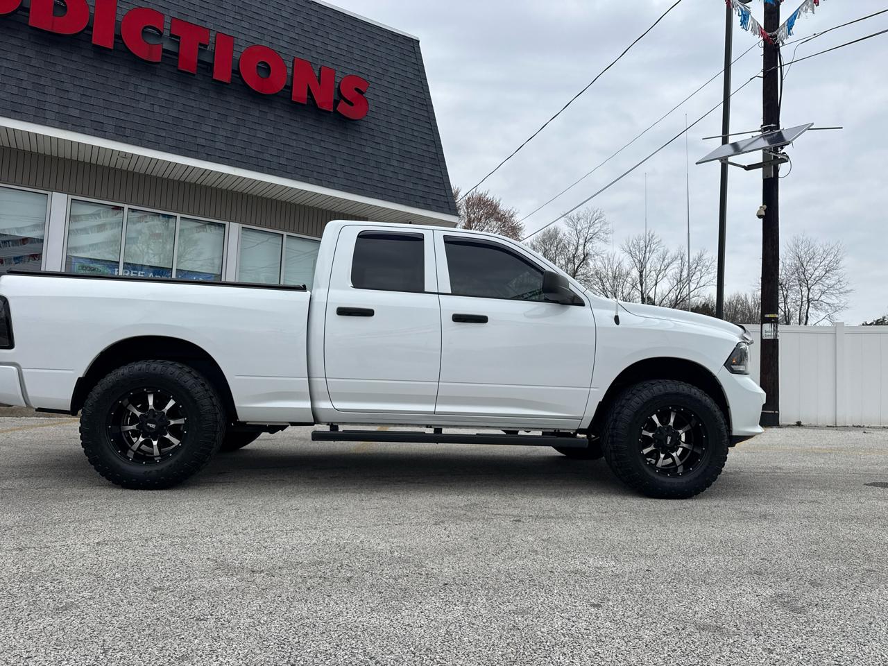RAM 1500 4WD Quad Cab 140.5" Big Horn 2016