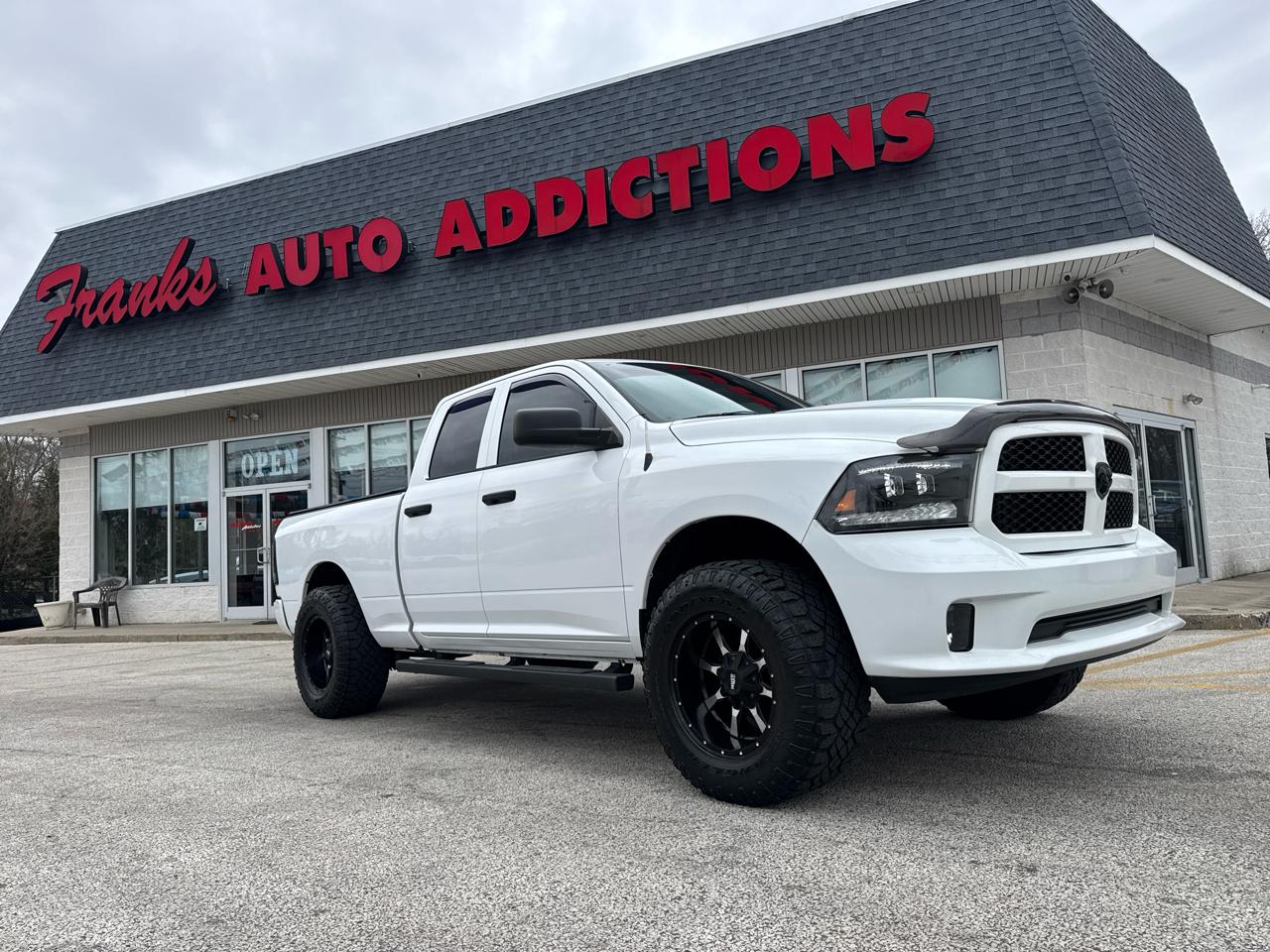 RAM 1500 4WD Quad Cab 140.5" Big Horn 2016