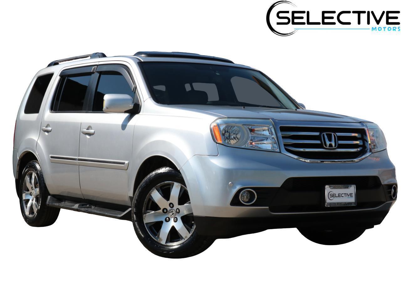 2014 Honda Pilot 4WD Touring w/RES & Navigation's photo
