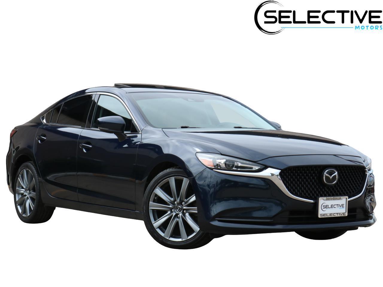 2018 Mazda EZ-6 Touring Auto's photo