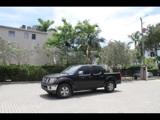 Black 2005 Nissan Frontier Pickup Truck Four-Wheel Drive Automatic