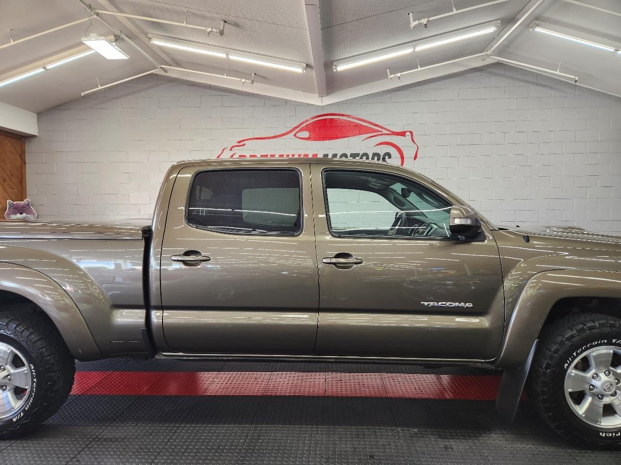 Toyota Tacoma 4WD Double Cab LB V6 AT TRD Sport (Natl) 2012