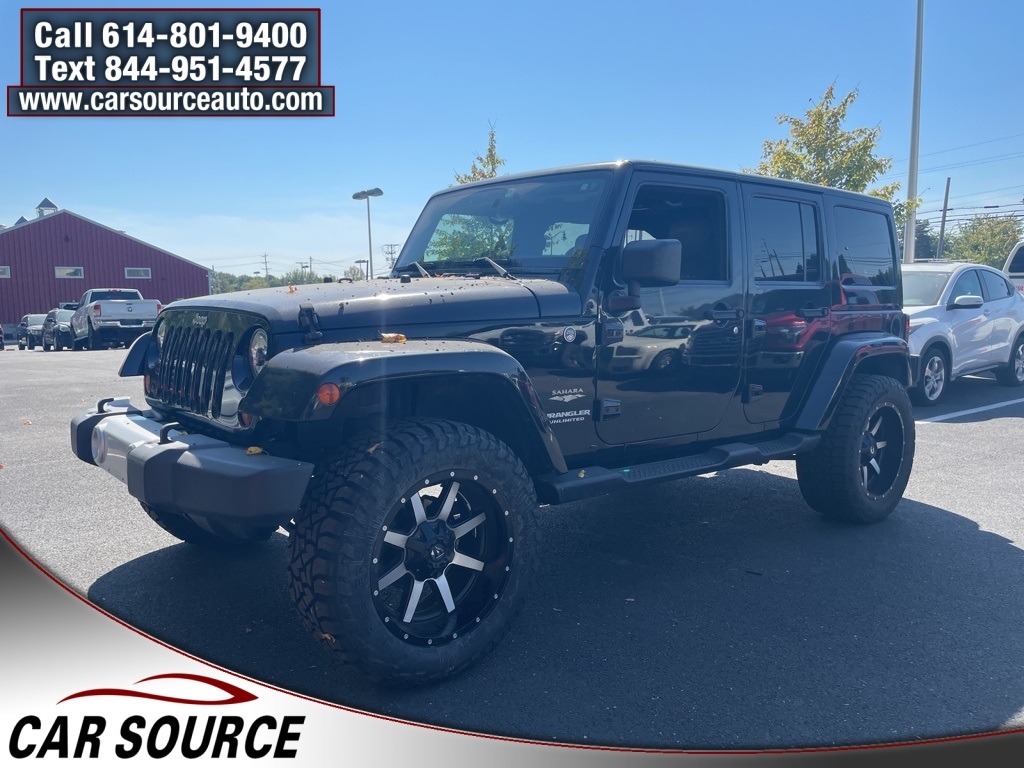 2013 Jeep Wrangler Unlimited Sahara photo 2