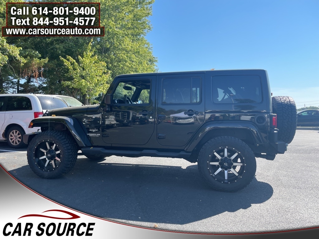 2013 Jeep Wrangler Unlimited Sahara photo 3