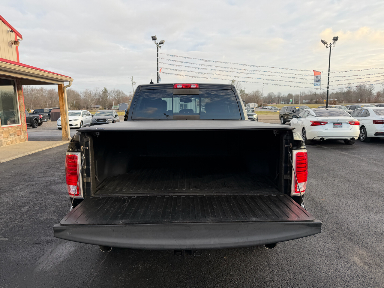 RAM 1500 4WD Crew Cab 140.5" Laramie 2014