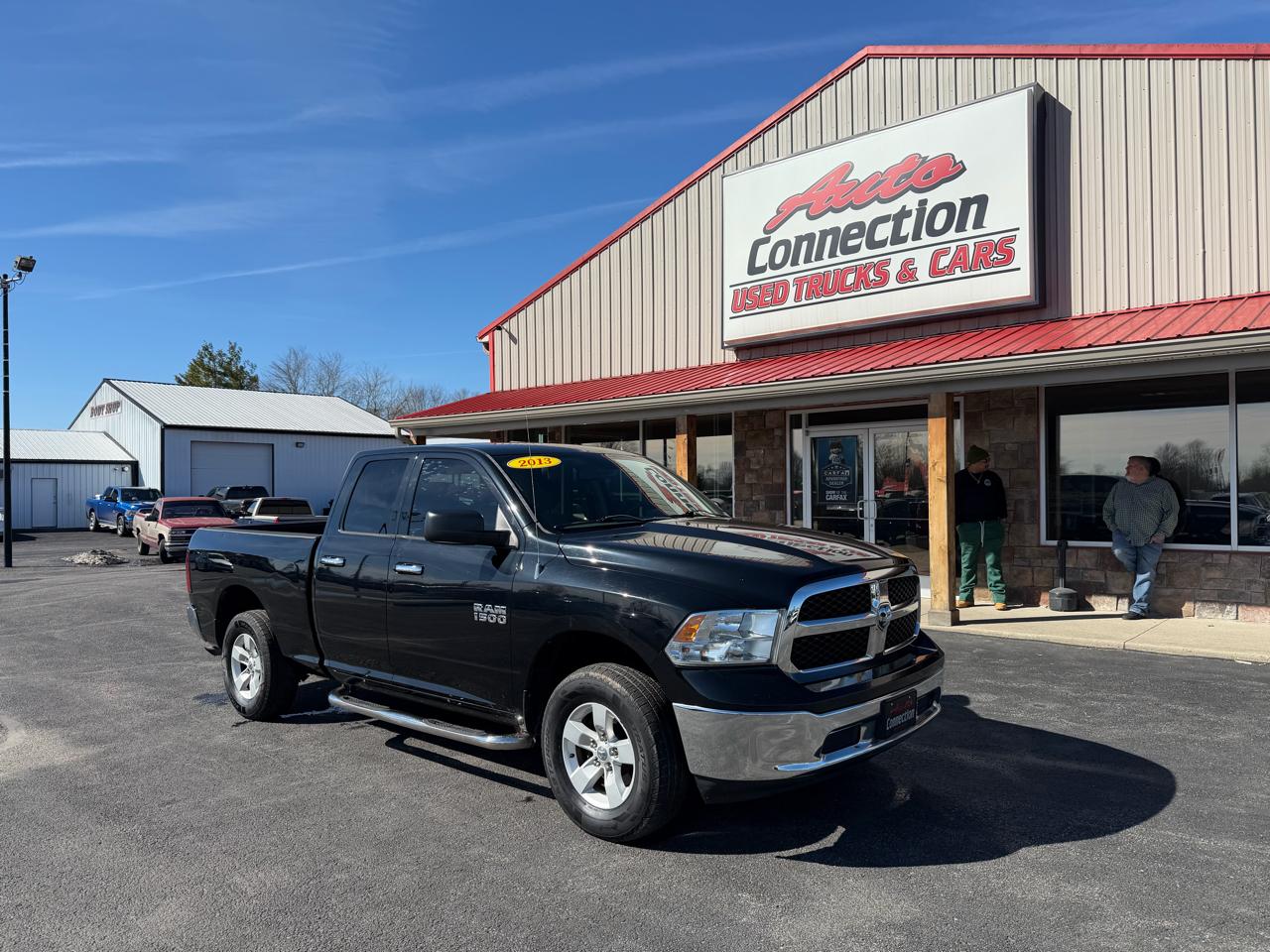 2013 RAM 1500 4WD Quad Cab 140.5" SLT