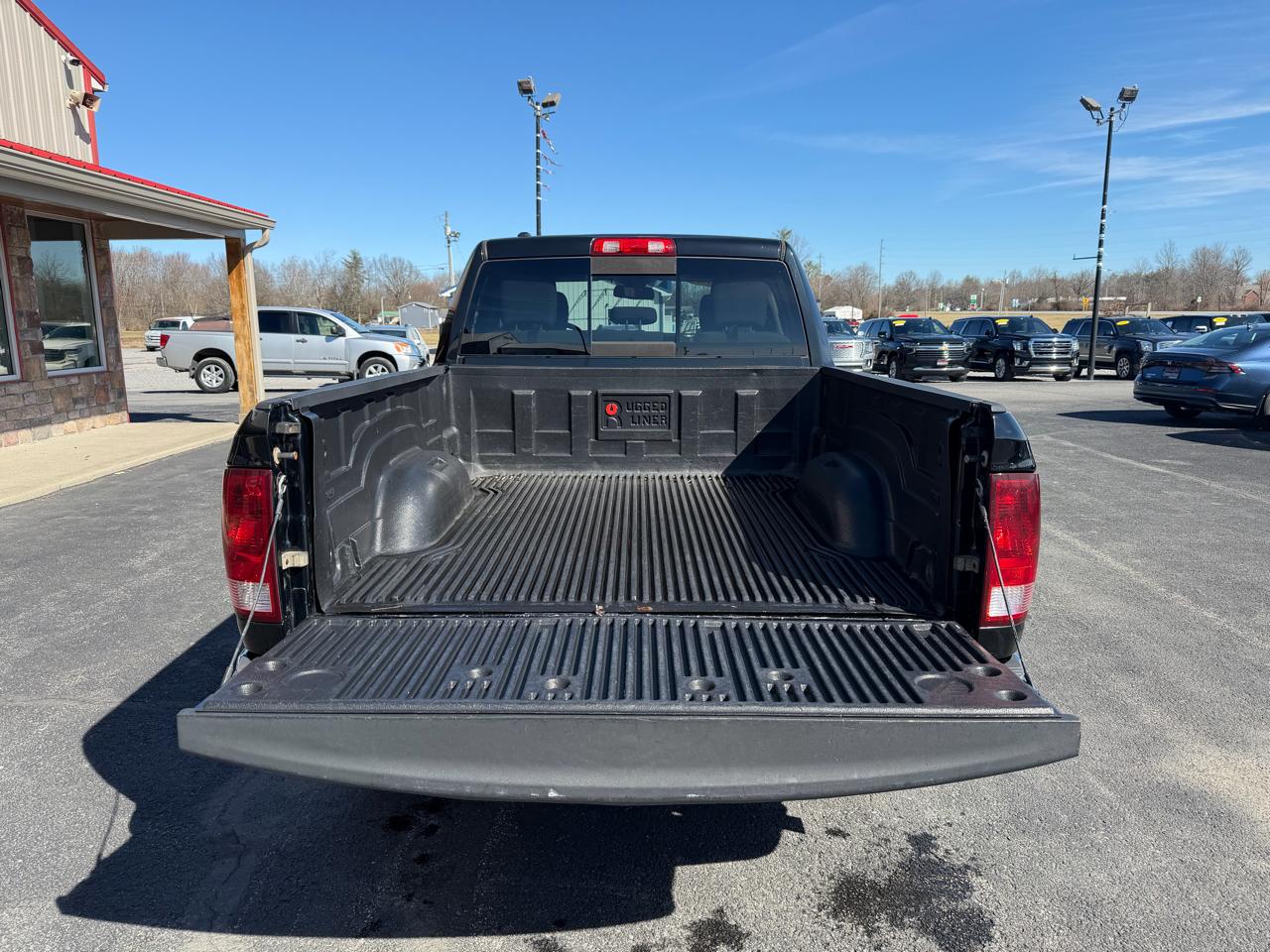 RAM 1500 4WD Quad Cab 140.5" SLT 2013