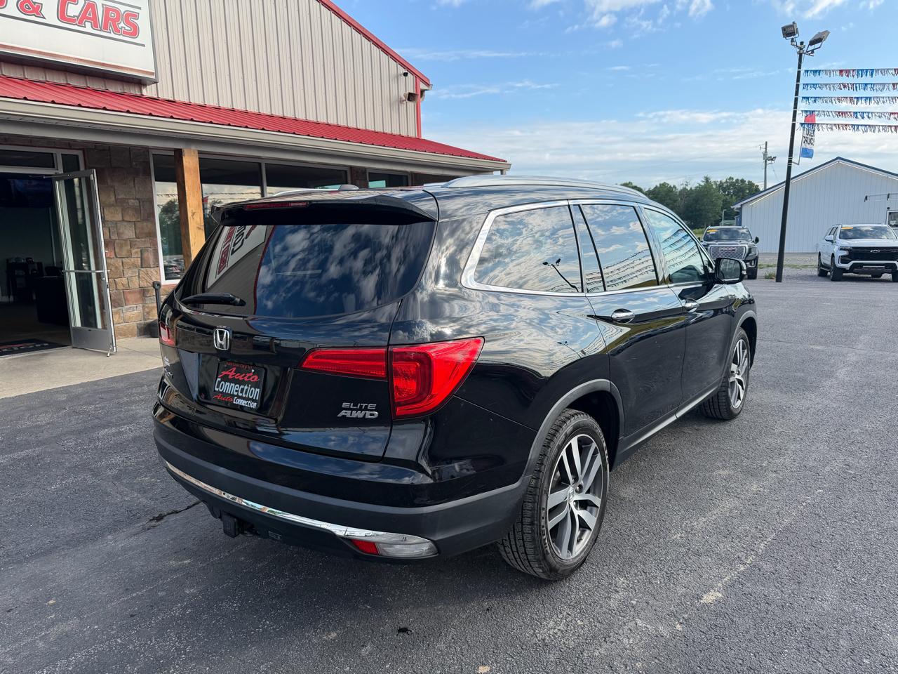 Honda Pilot AWD 4dr Elite w/RES & Navi 2016