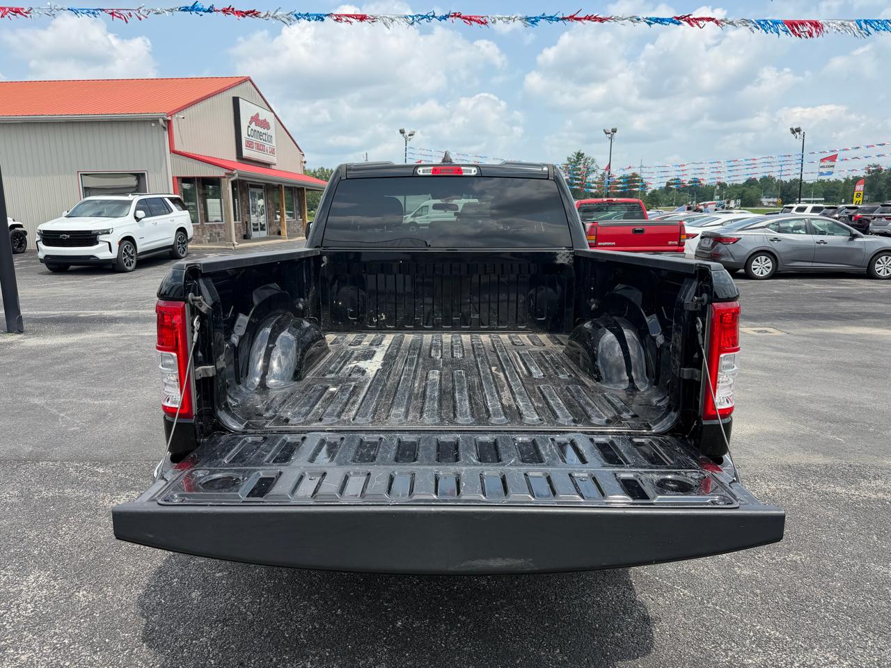 RAM 1500 Big Horn 4x4 Quad Cab 6'4" Box 2021