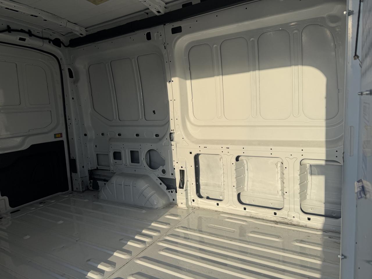 Ford Transit Cargo Van T-150 130" Med Rf 8670 GVWR RWD 2023