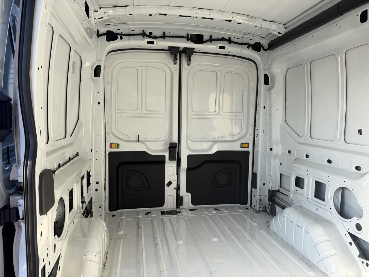 Ford Transit Cargo Van T-150 130" Med Rf 8670 GVWR RWD 2023