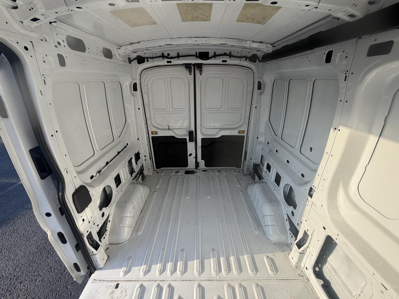 Ford Transit Cargo Van T-150 130" Med Rf 8670 GVWR RWD 2023